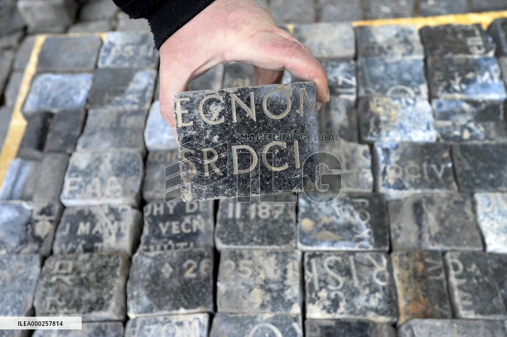 hundreds of cobblestones, made of cut Jewish gravestones, found during a reconstruction of Wenceslas Square