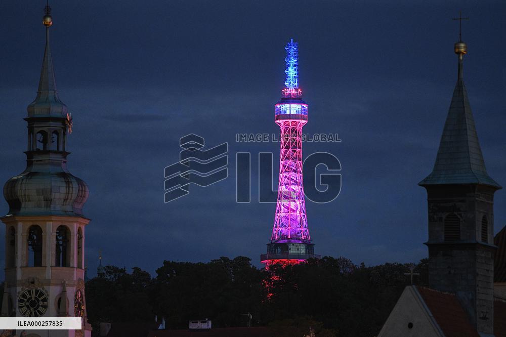 lookout tower on Prague's Petrin Hill shines in colours within the across-the-world gesture Giving Tuesday