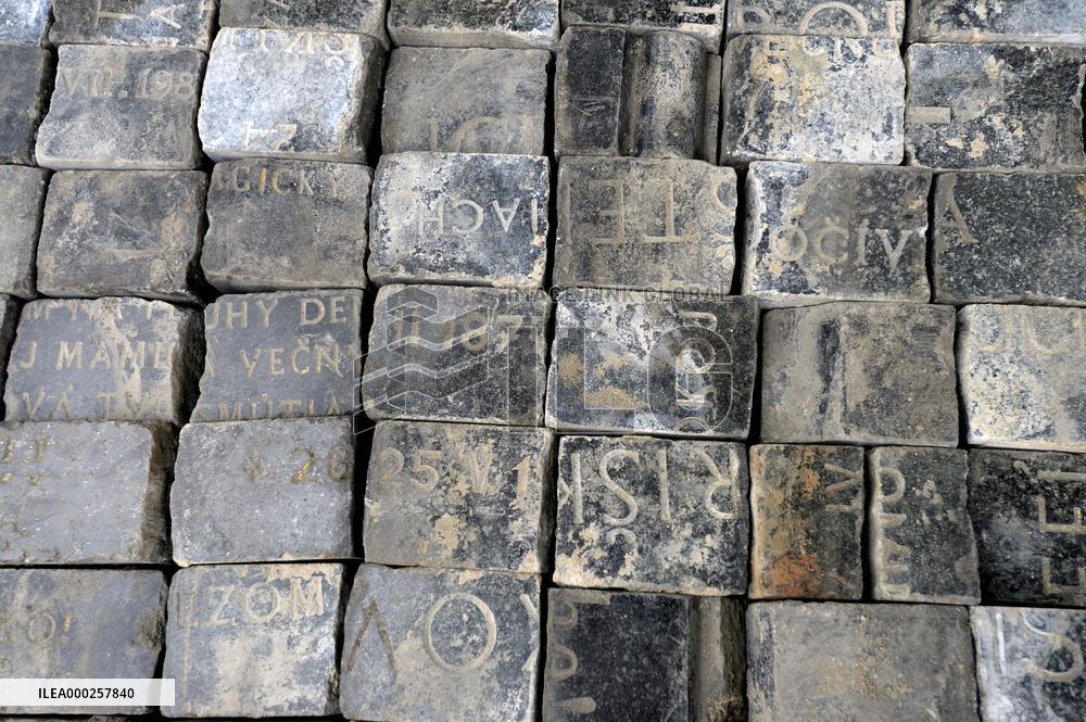 hundreds of cobblestones, made of cut Jewish gravestones, found during a reconstruction of Wenceslas Square