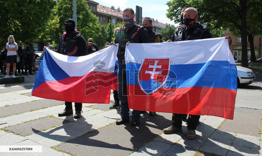 Czech followers of the nationalist Night Wolves motorcycle club, Prague, motorbike riders, flag