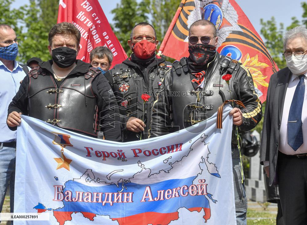 Konev, Czech followers of the nationalist Night Wolves motorcycle club, Prague, motorbike riders, flag