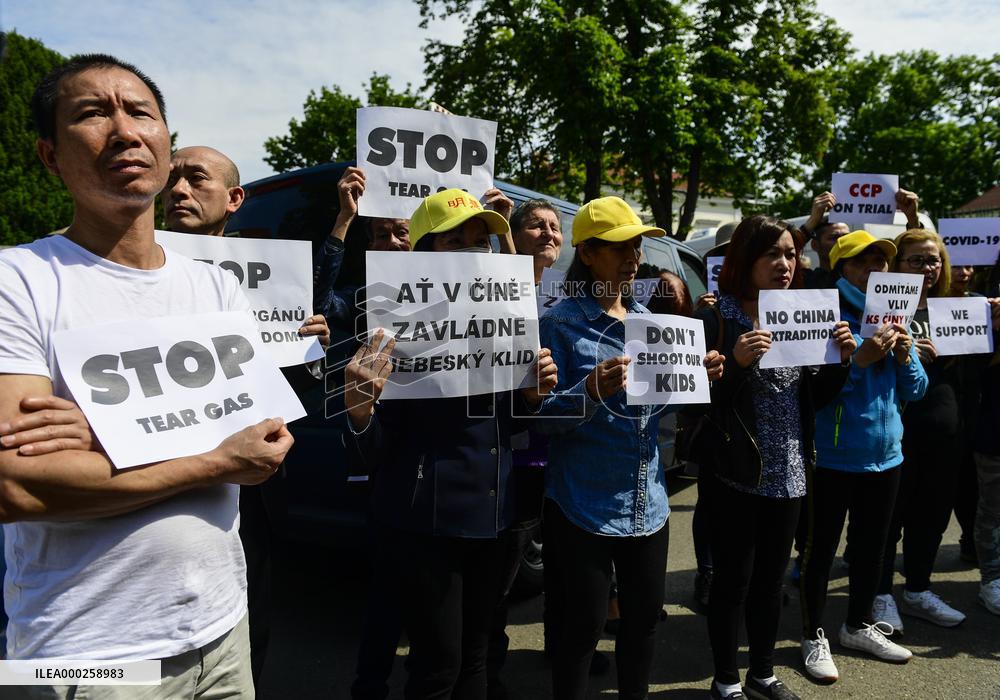 performance to stage Trial of Communist Party of China outside Embassy of China in Prague, protest