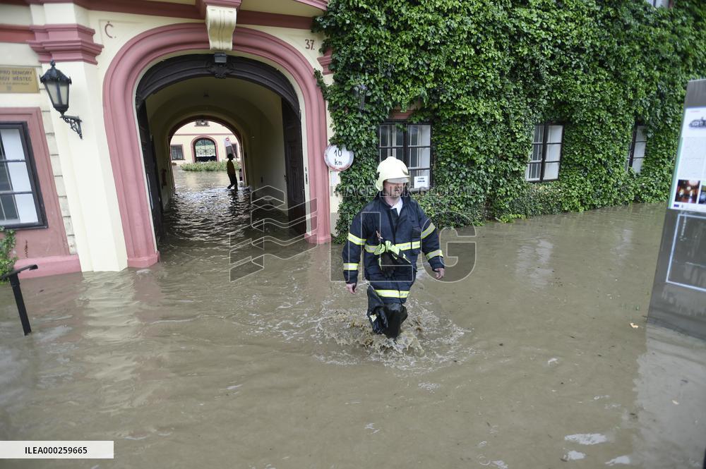 firefighters evacuated the old people's home in Hermanuv Mestec after a nearby pond dam overflowed amid torrential rains
