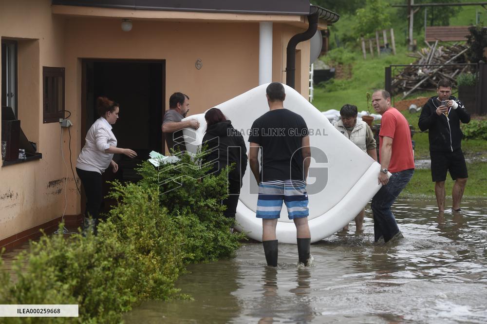 flood damage after torrential rains in Vapenny Podol Village