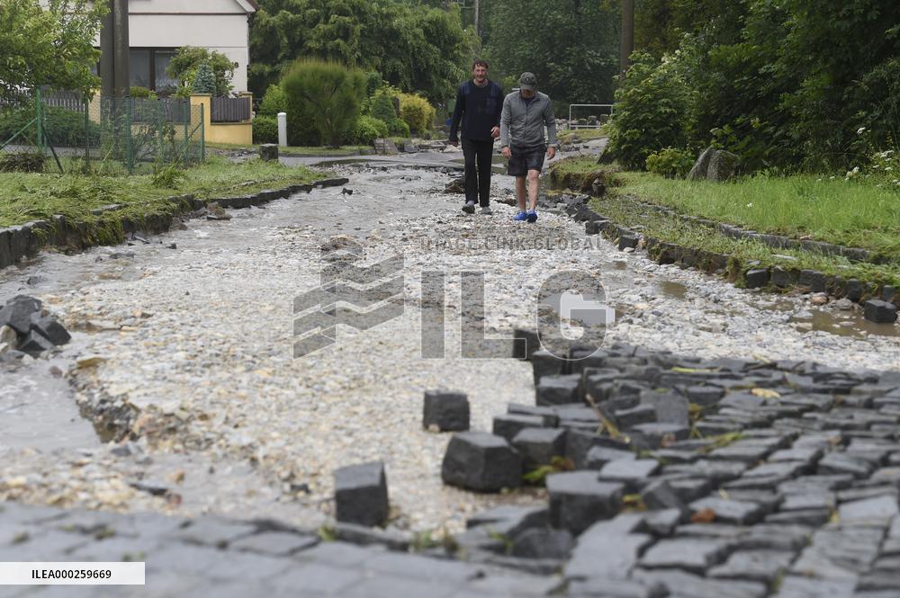 flood damage after torrential rains in Vapenny Podol Village