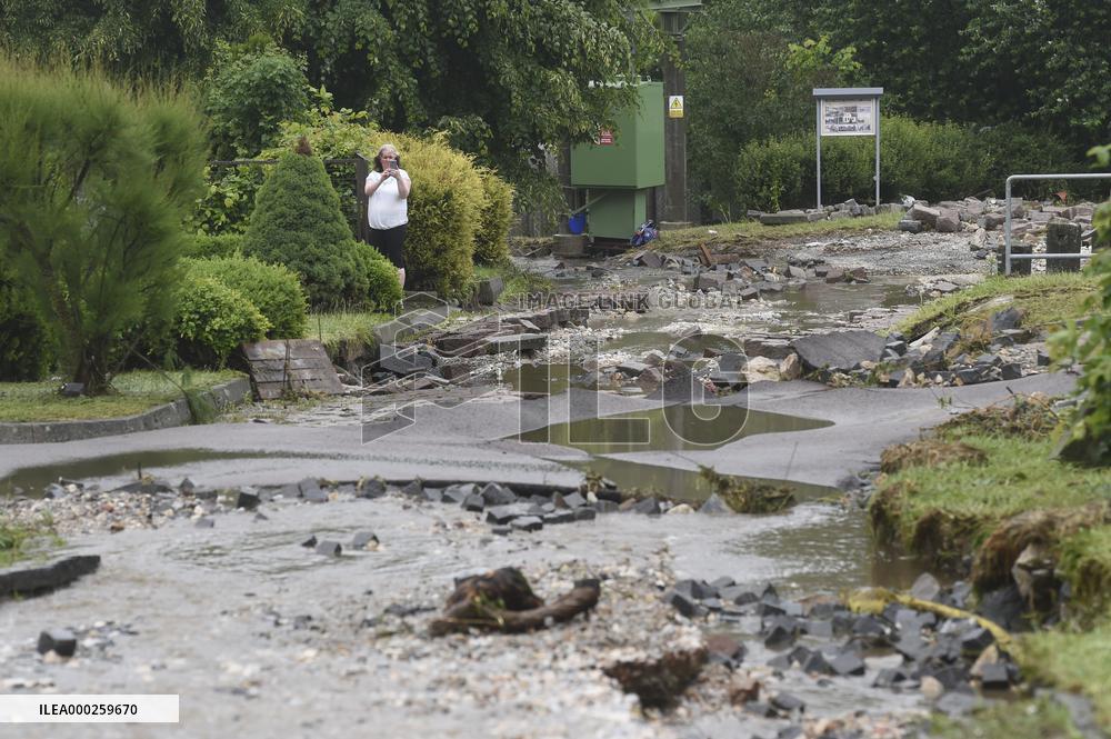 flood damage after torrential rains in Vapenny Podol Village