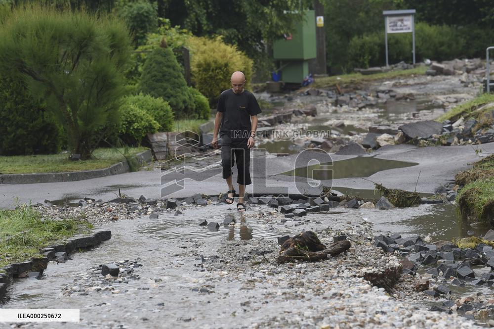 flood damage after torrential rains in Vapenny Podol Village