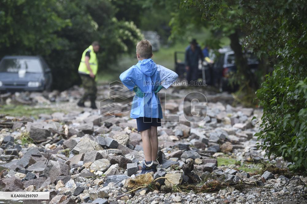 flood damage after torrential rains in Vapenny Podol Village