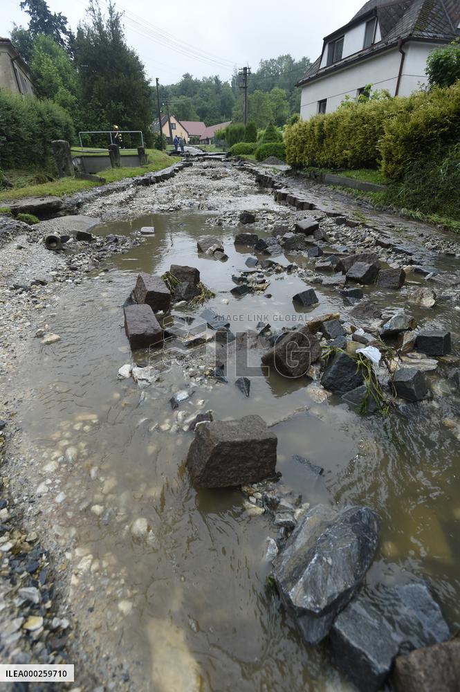 flood damage after torrential rains in Vapenny Podol Village
