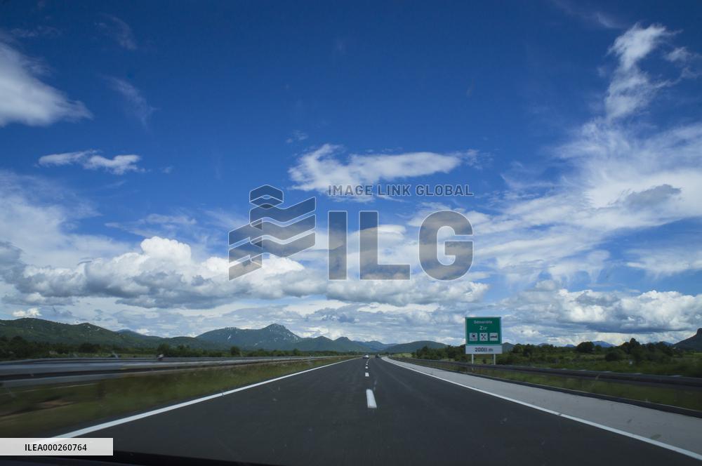 A1 motorway direction to the coastline, highway, low traffic, rideable, almost empty, blue sky, white clouds
