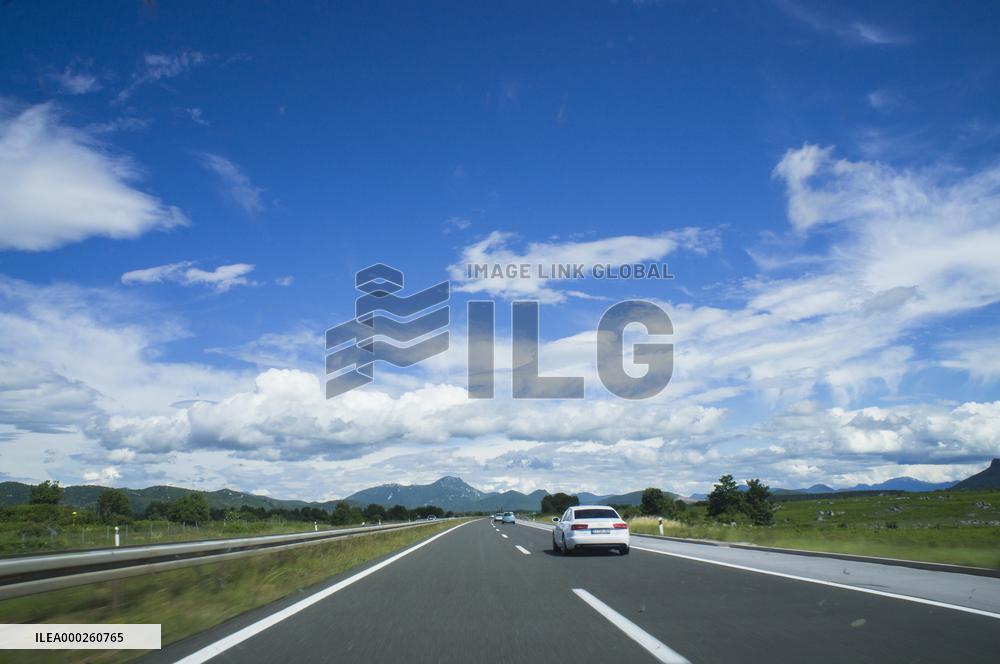 A1 motorway direction to the coastline, highway, low traffic, rideable, almost empty, blue sky, white clouds