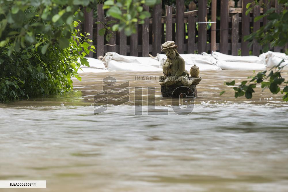 a garden flooded by Anensky Stream after heavy rains in Radim Village, vodyanoy, vodyanoi