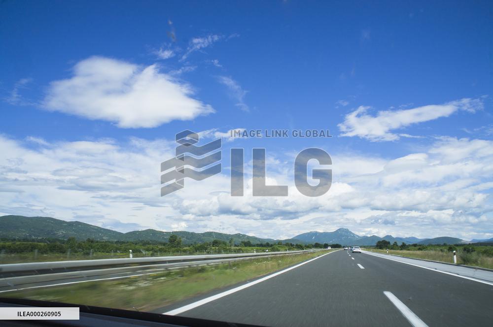 A1 motorway direction to the coastline, highway, low traffic, rideable, almost empty, blue sky, white clouds
