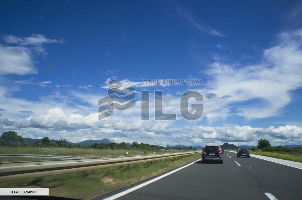 A1 motorway direction to the coastline, highway, low traffic, rideable, almost empty, blue sky, white clouds