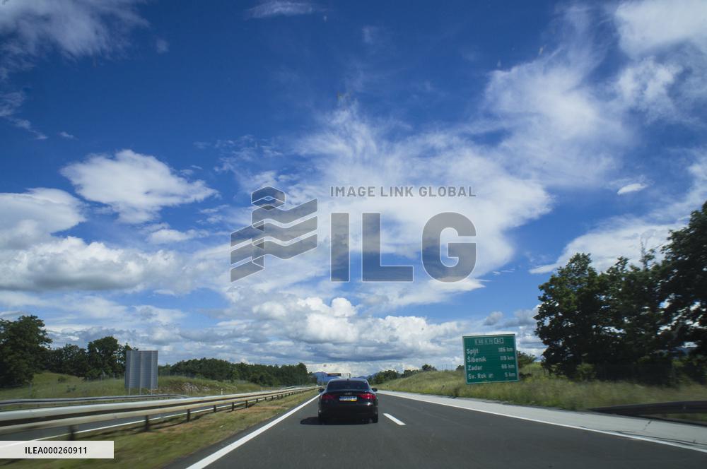 A1 motorway direction to the coastline, highway, low traffic, rideable, almost empty, blue sky, white clouds