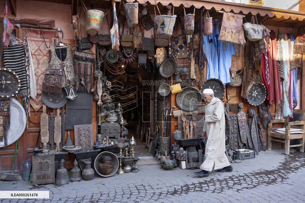 sell of souvenirs, cookware, products from letaher and wood  in medina