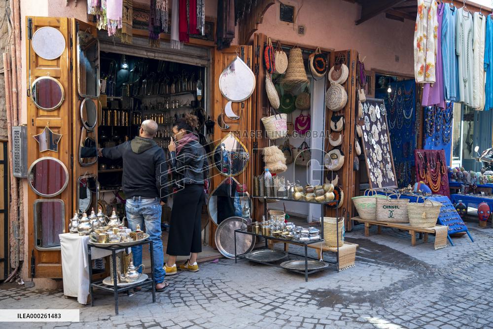 sell of souvenirs, cookware, products from letaher and wood  in medina