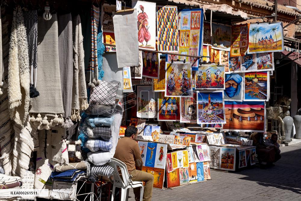 sell of souvenirs, cookware, products from letaher and wood  in medina