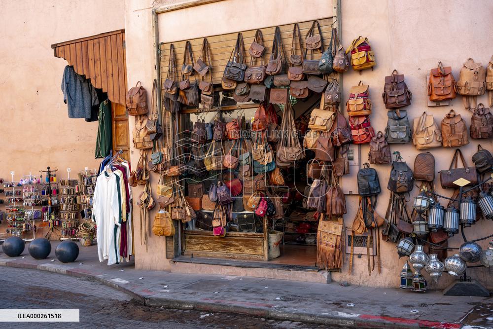 sell of souvenirs, cookware, products from letaher and wood  in medina