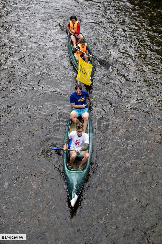 water tourists in a boat on the Orlice river, boats