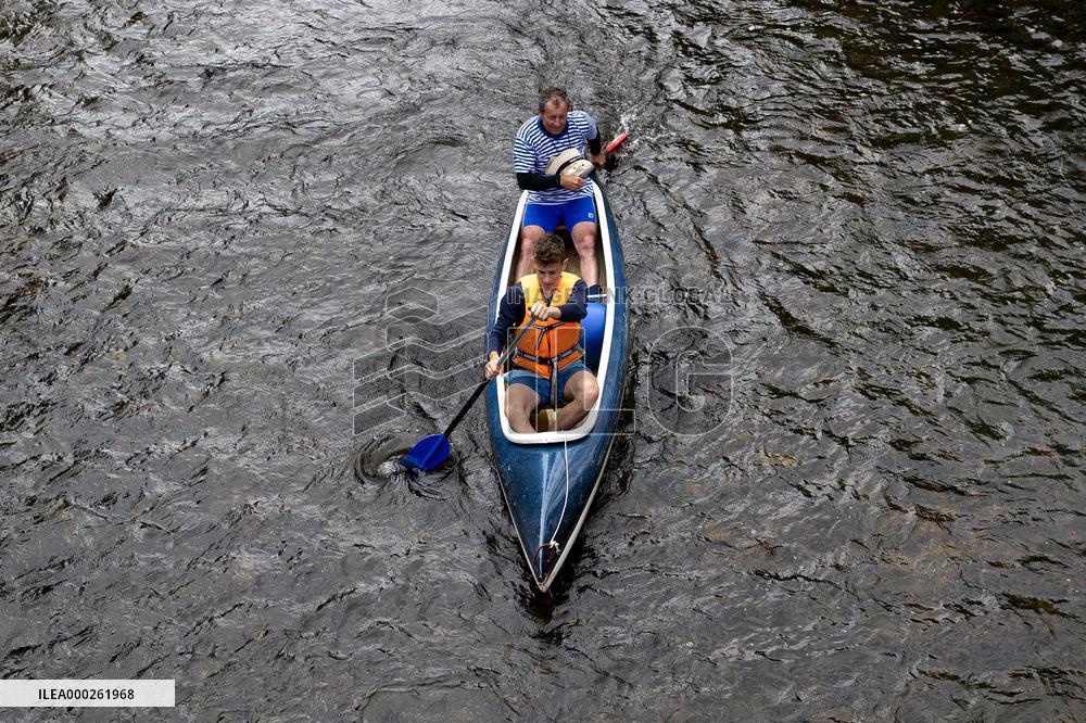 water tourists in a boat on the Orlice river