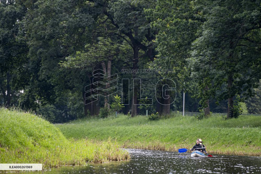 water tourists in a boat on the Orlice river