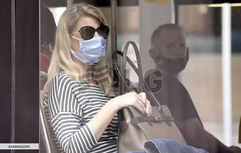 Woman face mask, public transport