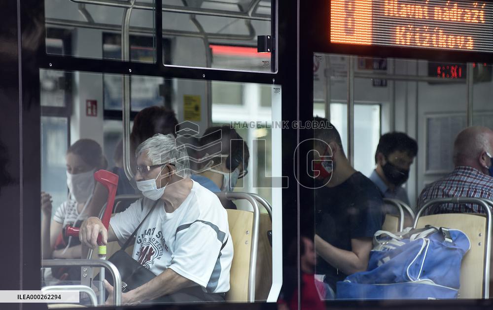 Man, face mask, public transport