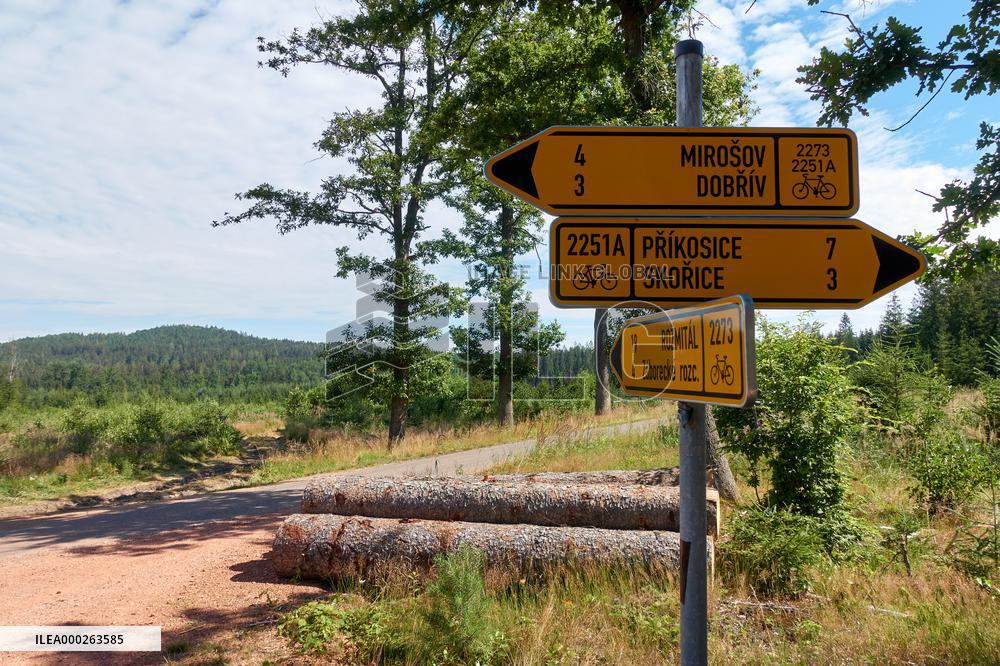 Forested highlands, mountain Brdy, touristic signs