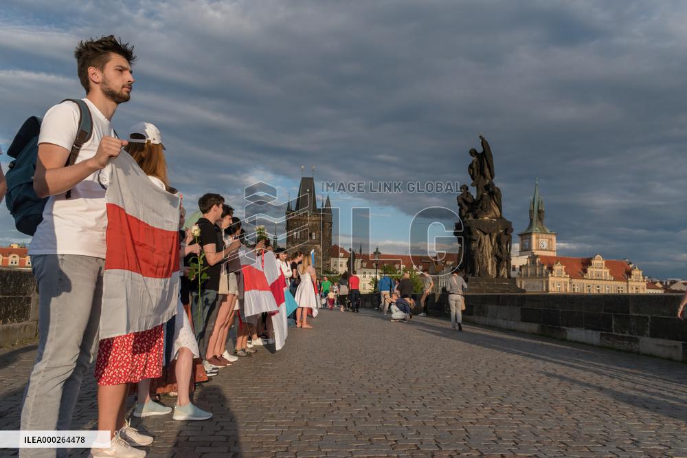 symbolic human chain at the Charles Bridge in Prague, support for human rights and free elections in Belarus