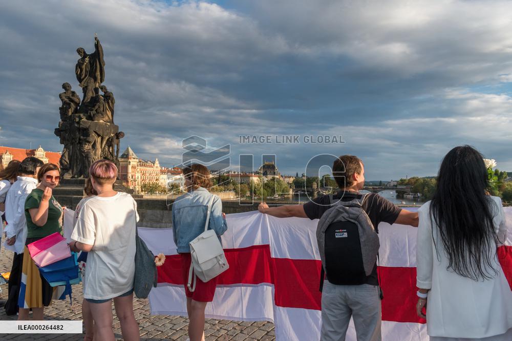 symbolic human chain at the Charles Bridge in Prague, support for human rights and free elections in Belarus