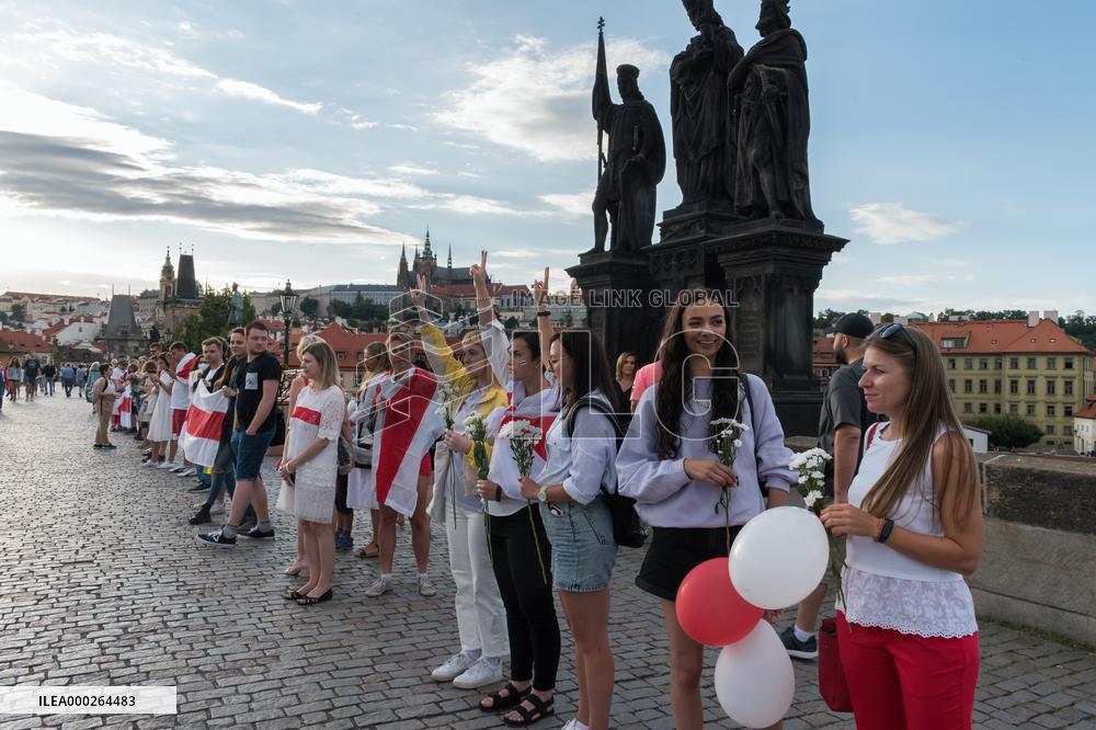 symbolic human chain at the Charles Bridge in Prague, support for human rights and free elections in Belarus