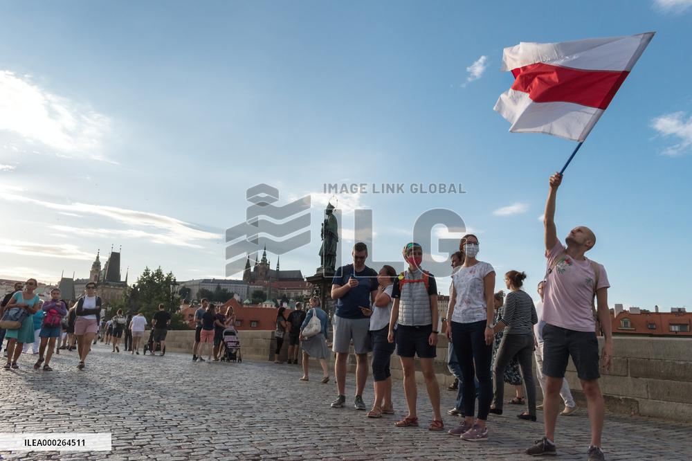 symbolic human chain at the Charles Bridge in Prague, support for human rights and free elections in Belarus