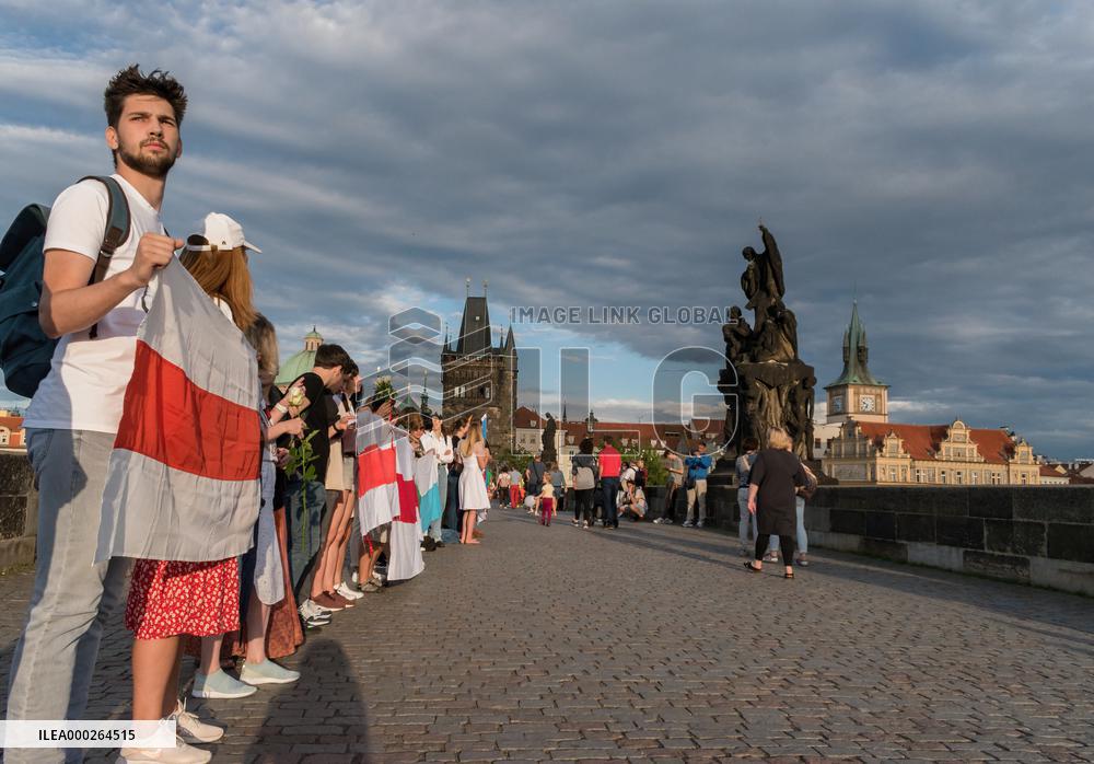 symbolic human chain at the Charles Bridge in Prague, support for human rights and free elections in Belarus