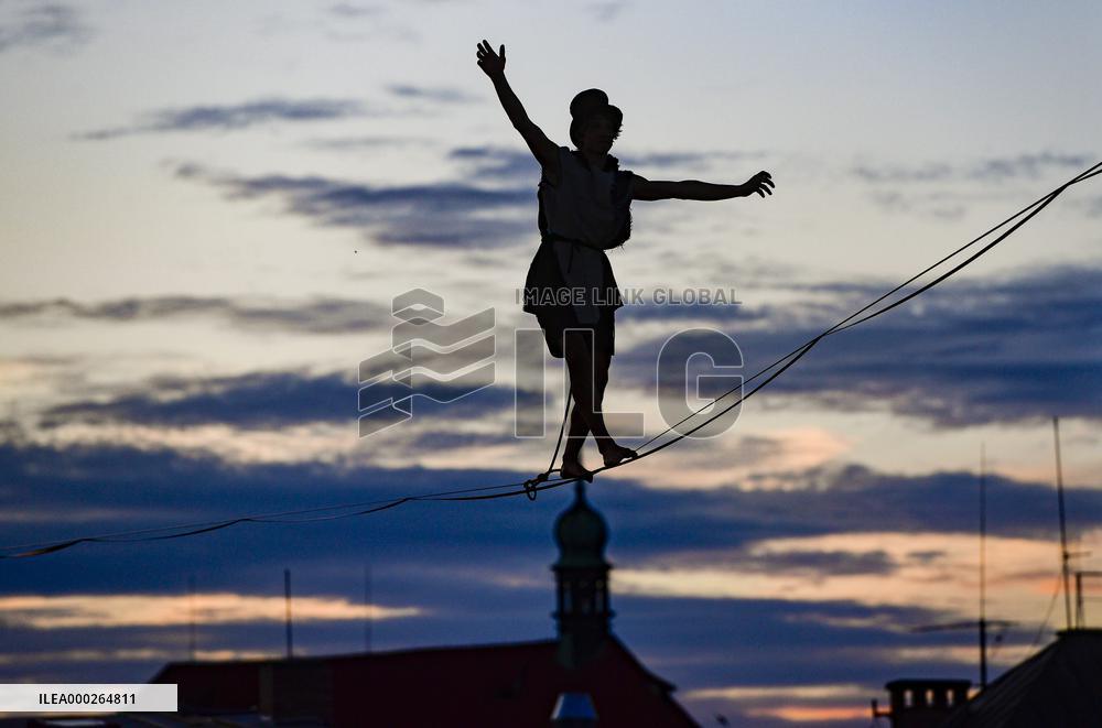 filming of Andersen's fairy tale The Shepherdess and the Chimney Sweep on the roofs of the Lucerna Palace in Prague, acrobatics