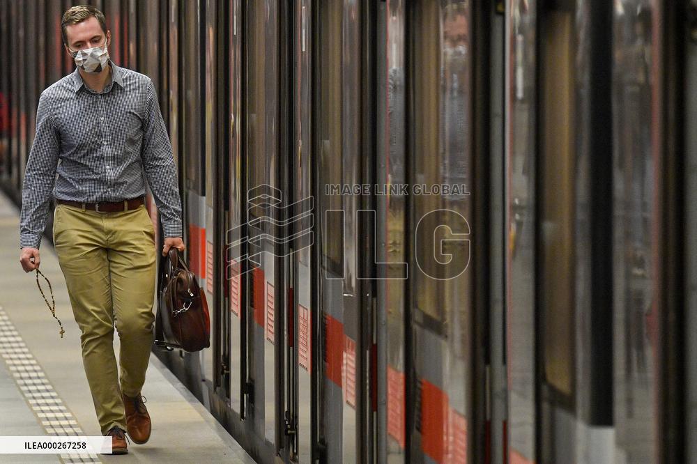 man, face masks, coronavirus, COVID-19, Prague, metro, Muzeum station