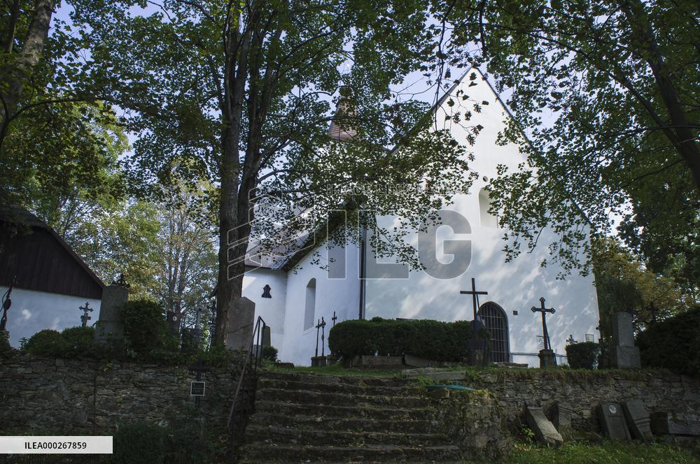 The Church of Saint Maurice, Mourenec, graveyard