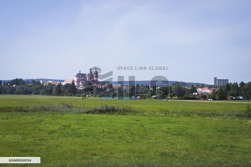 The Church of Assumption of the Virgin Mary, silo ZNZ Prestice, landscape