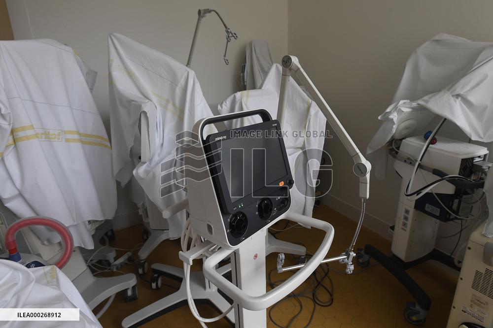 A medic nurses a patient at Intensive Care Unit