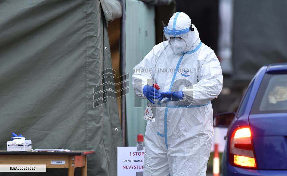 drive-in point, polling place, Senate elections, second round, election commission in protective clothing, suit, disinfection