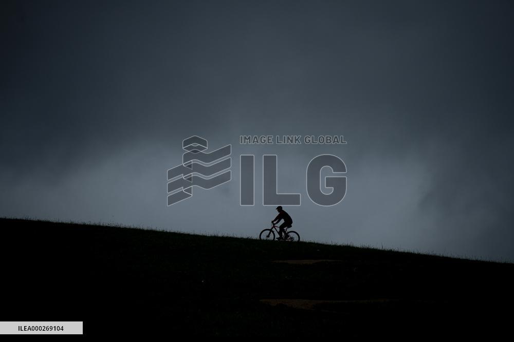 pump track circuit for cyclists, cyclist, silhouette