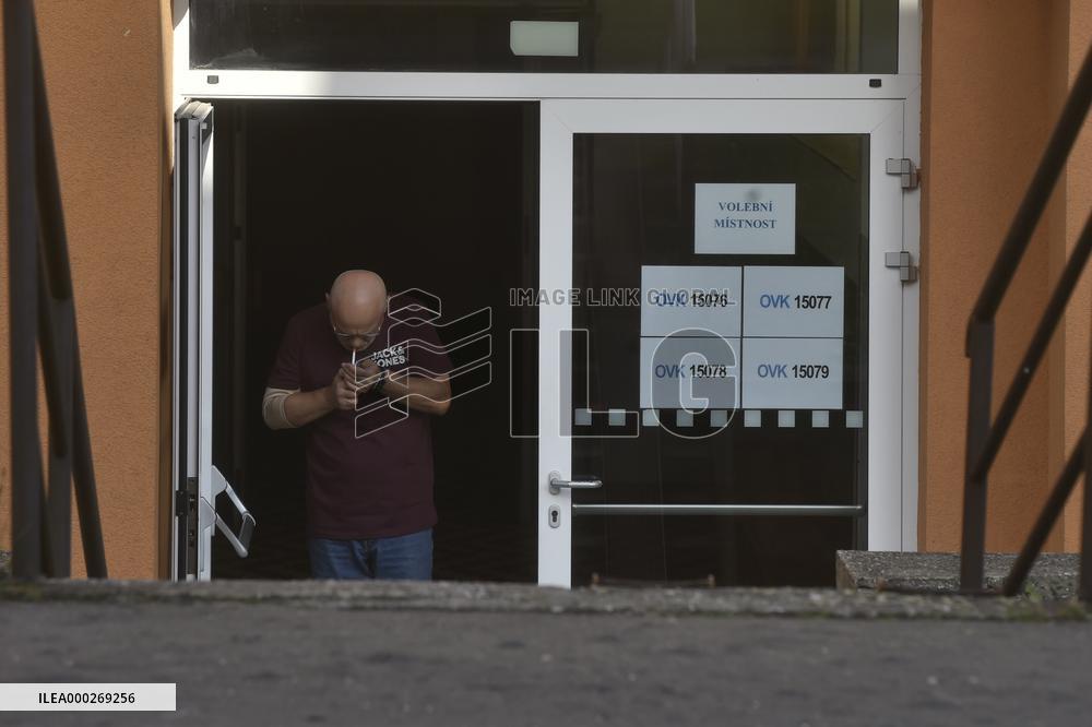 Polling place, Senate elections, second round, election commission, voter, people, cigarette, smoking