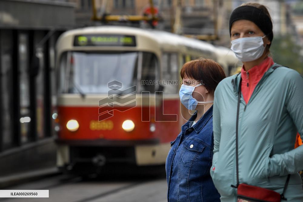 public transport stops, people, face masks, coronavirus, COVID-19, Prague