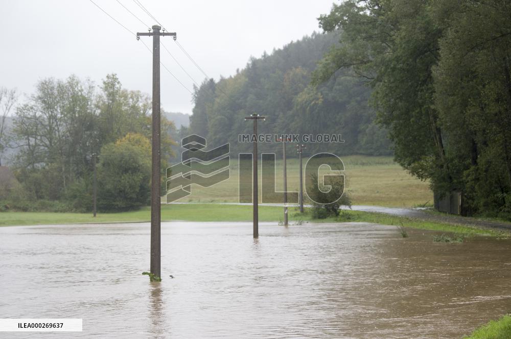 River Novohradka, village Luze, heavy rain, raised water level