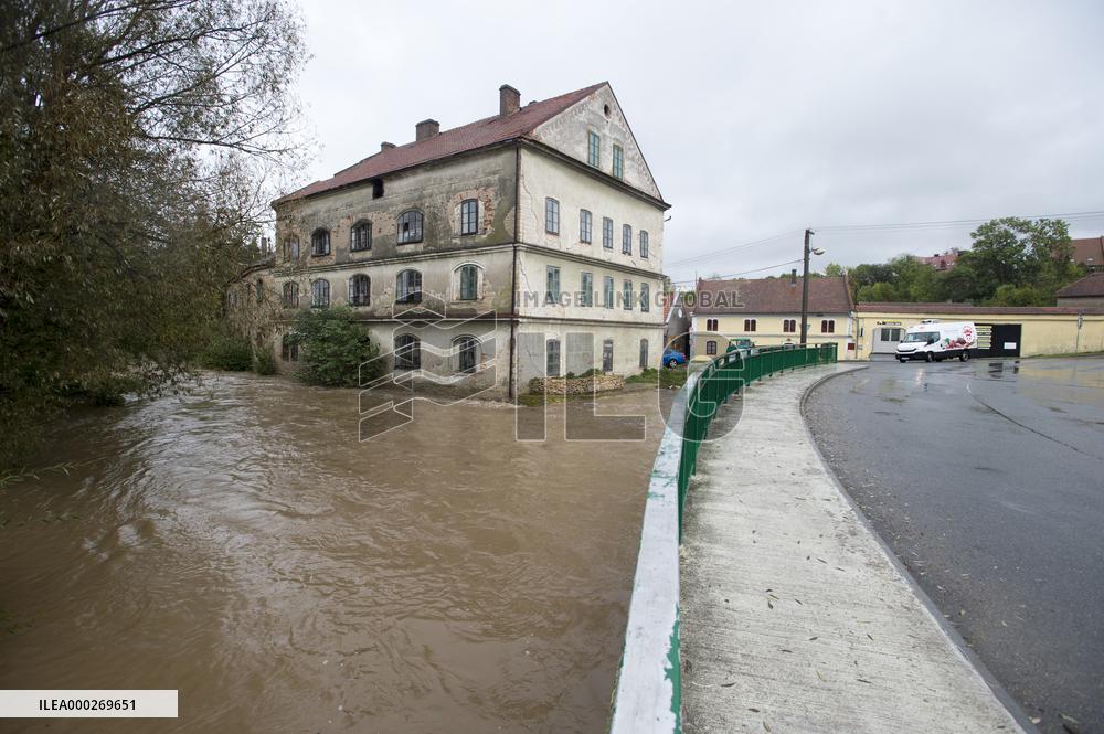 River Novohradka, village Luze, heavy rain, raised water level