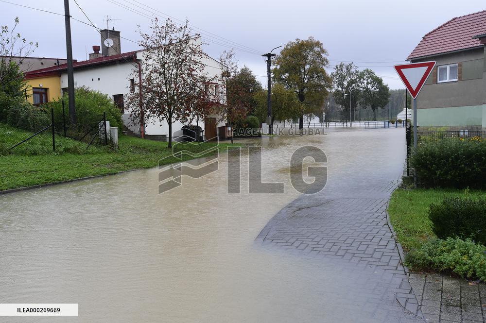 Heavy rainfalls, flood, River Becva, village Usti