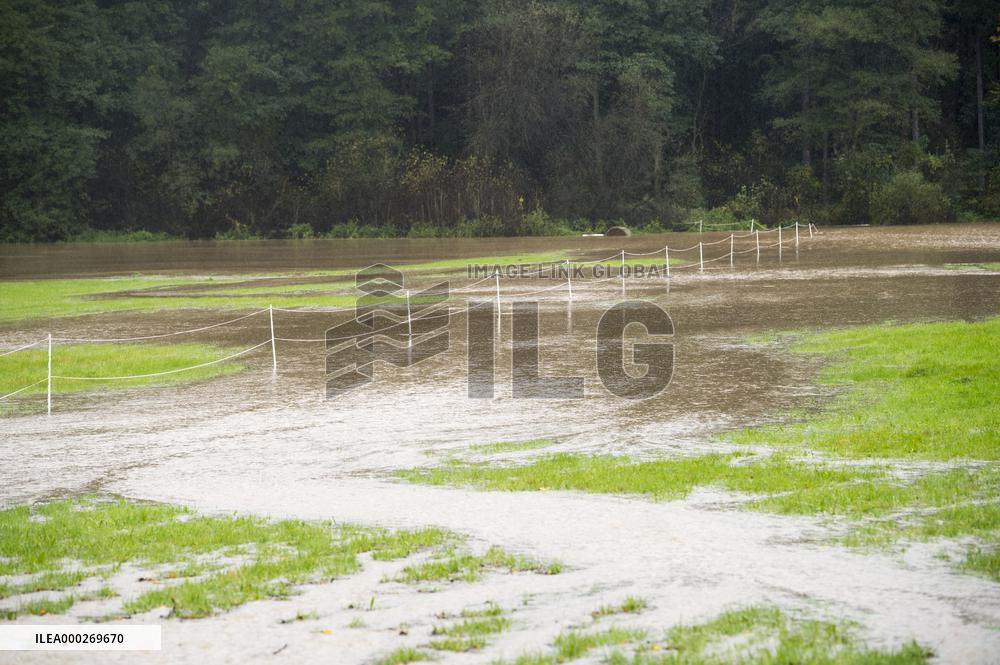 River Novohradka, village Luze, heavy rain, raised water level