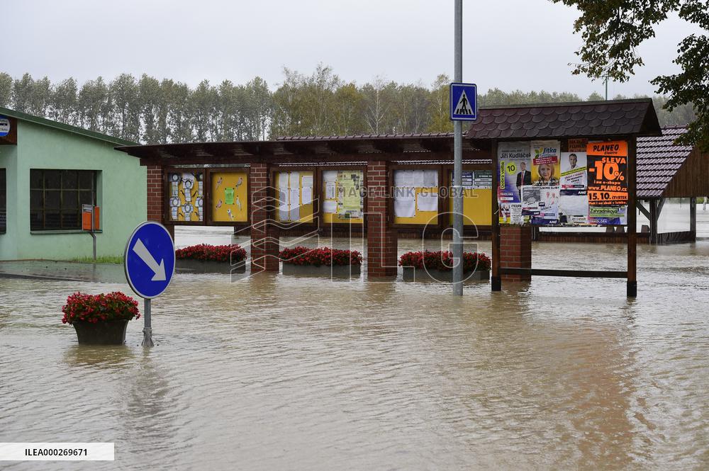 Heavy rainfalls, flood, River Becva, village Usti