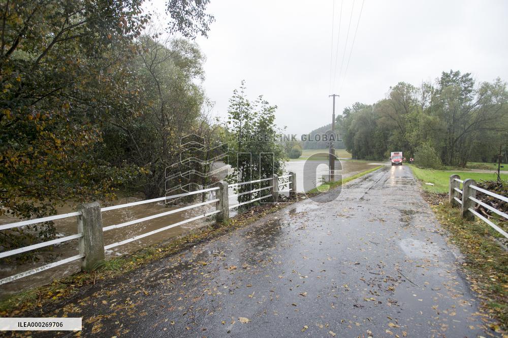 River Novohradka, village Luze, heavy rain, raised water level