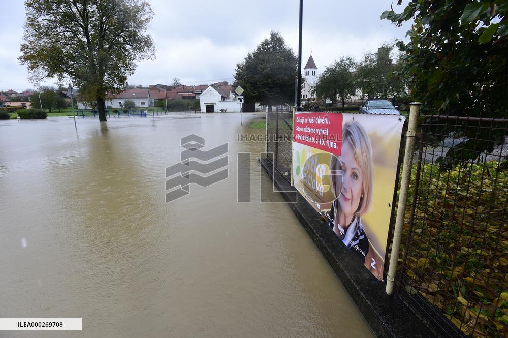 Heavy rainfalls, flood, River Becva, village Usti